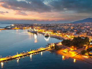 Fototapeta na wymiar Aerial seaside view over seaside city of Kalamata, Greece at sunset