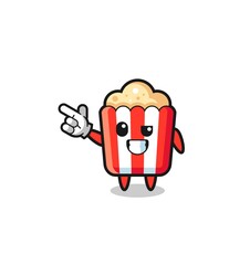 popcorn mascot pointing top left