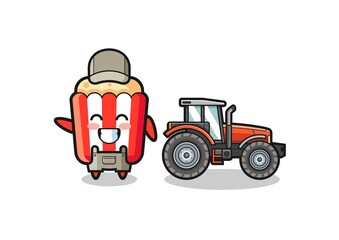 the popcorn farmer mascot standing beside a tractor