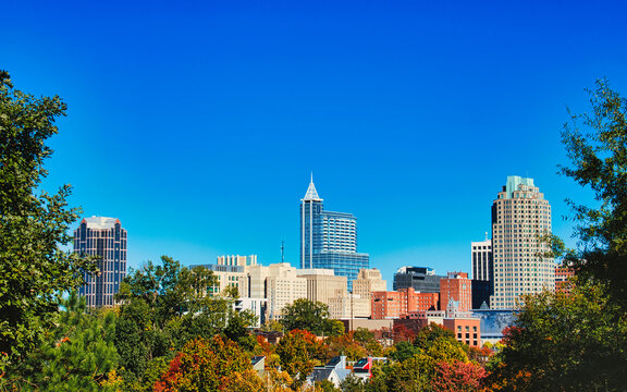 A beautiful city skyline of downtown Raleigh, North Carolina on a warm Autumn afternoon.