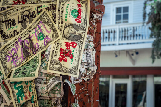 scribles on dollar bills