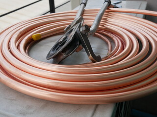 closeup copper pipe for installation of air conditioning systems.