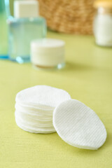 Fototapeta na wymiar New clean cotton pads on table, closeup