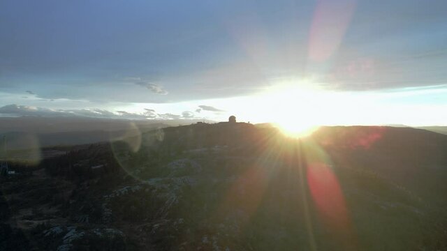 Bright Sunlight Shining Over Grakallen Mountain In Bymarka Area In Trondheim, Trondelag, Norway. - aerial circle right