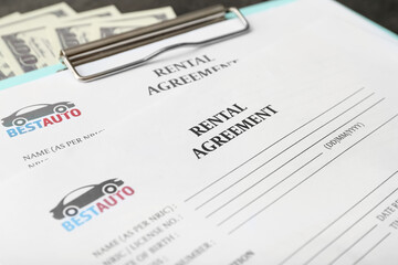 Obraz premium Clipboard with rental agreements, closeup