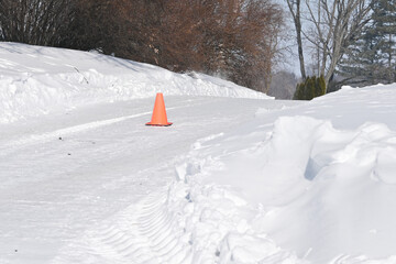 Cone on Snowy Road