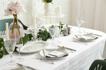 Beautiful table setting for wedding celebration in restaurant