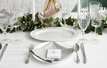 Beautiful table setting for wedding celebration in restaurant