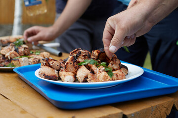 The chef decorates the dish with a barbecue cooked on the grill , a fun weekend