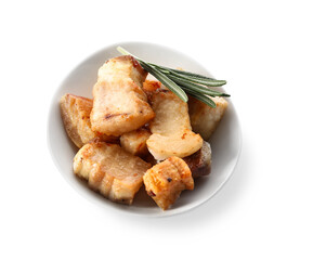Bowl with tasty cracklings on white background