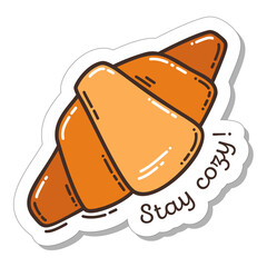 Colorful hand-drawn cold days mood sticker with a croissant in doodle style isolated on white background. Cute vector collection for seasonal decoration.