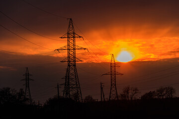 High voltage power line at sunset