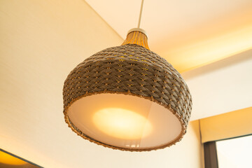 close-up beautiful wicker lamp with lighting