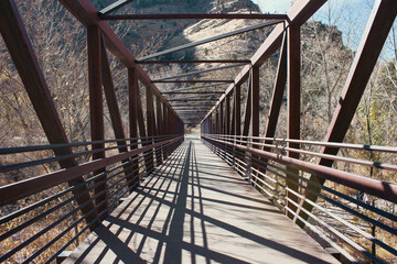 Bridge Over the River, A metal bridge structure with shadows