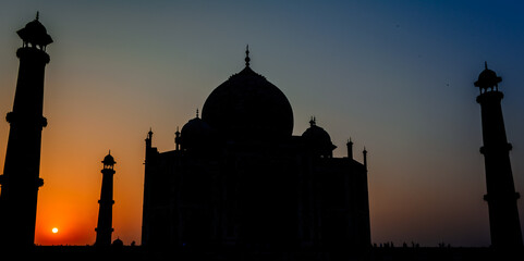The Taj Mahal is an ivory-white marble mausoleum on the bank of the Yamuna river in the city of...