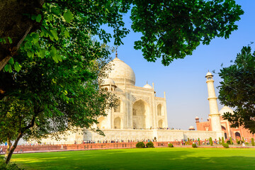 The Taj Mahal is an ivory-white marble mausoleum on the bank of the Yamuna river in the city of...