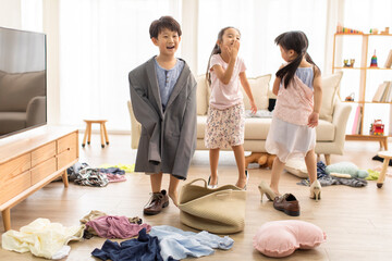 Cute Chinese children dressing up like adults