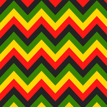 Jamaican color zigzag seamless pattern. Chevron Rastafarian on classic rasta reggae colors background. Vector illustration wallpaper.