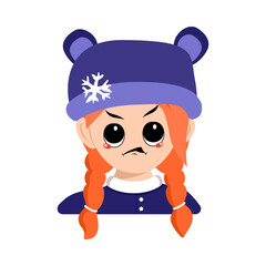 Girl with big eyes and angry emotions, grumpy face, furious eyes in bear hat with snowflake. Cute child with furious expression in winter headdress. Head of adorable kid