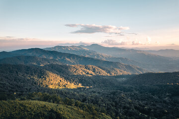 Fototapeta premium Scenic View Of Mountains Against Sky During Sunset