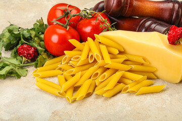 Raw penne rigate for cooking