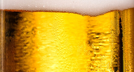 Background Cool beers with beer bubbles on top a glass at the party