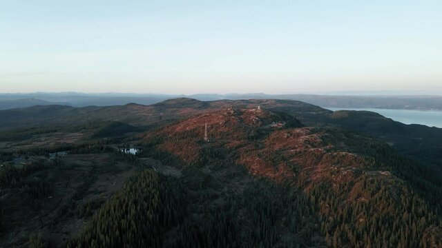 Grakallen Mountain With Dense Forest In Trondheim, Norway. - aerial ascend
