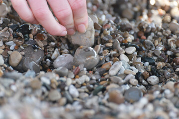 hand with pebbles