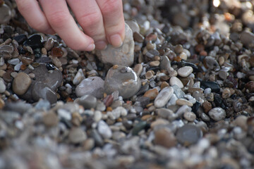 hand with pebbles