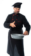 portrait of a male chef in a black suit, uniform with canned food, plate, basket, saucepan, frying pan or knives. isolated white background