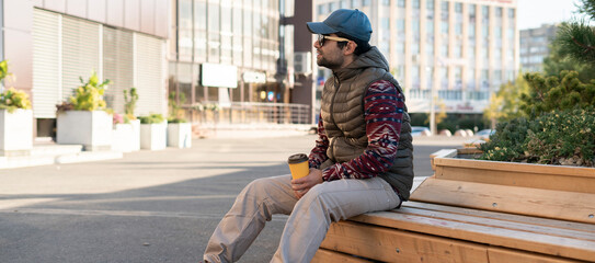 young male person portrait in urban city street