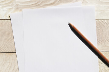 White writing paper mockup template on wood background