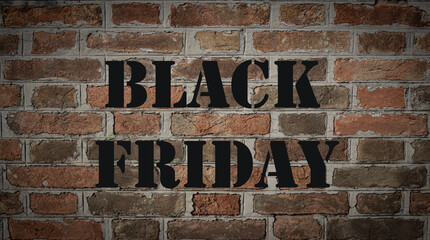 Red brick wall with black lettering BLACK FRIDAY. Sales concept