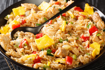 Arroz Chaufa Peruvian Fried Rice close up in the bowl on the table. Horizontal