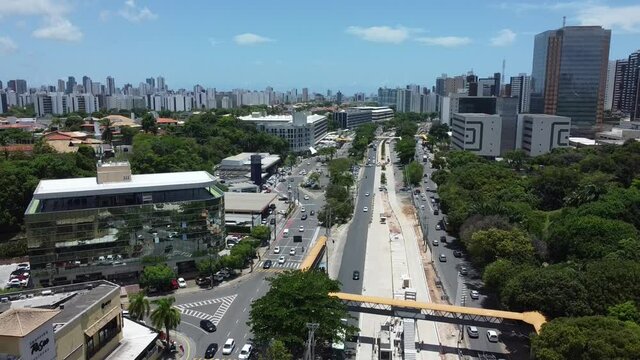 salvador, bahia, brazil - november 10, 2021: aerial view of vehicle movement along the construction of an exclusive lane for vehicles of the BRT transport system in the city of Salvador.