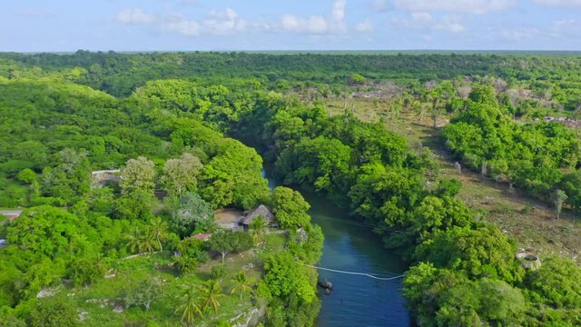 Lush Forest Landscape Surrounding The Rio Yuma River In Dominican Republic - aerial shot