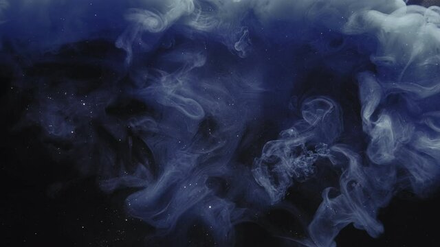 Night smoke cloud. Ink water drop. Cosmic explosion. Blue purple glitter dust particles mist splash animation effect layer for transition on dark abstract art background.
