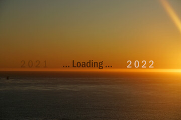 Landscape sunrise morning scene with Loading 2021 to 2022 letters on the Sea twilight color , Eand...