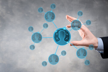 Businessman holding on hand icon of user man,woman low poly polygon style. Internet icons interface...