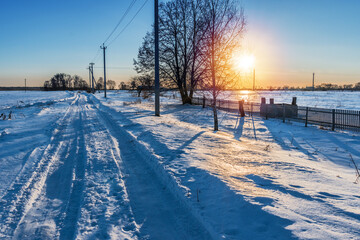 Winter out of the big city. Snowy rural winter landscape.