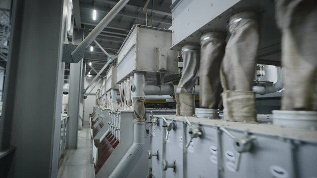 Separators in a large industrial plant. Crushing sunflower seeds, and separating the husks from the kernels.