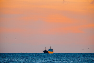 Anchored cargo ships