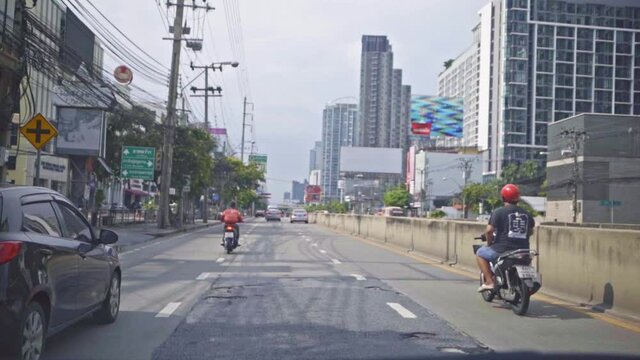 Bangkok, Thailand - 24 Sep 2021 : Driving a Car through Ratchadapisek Road in Bangkok City Center.