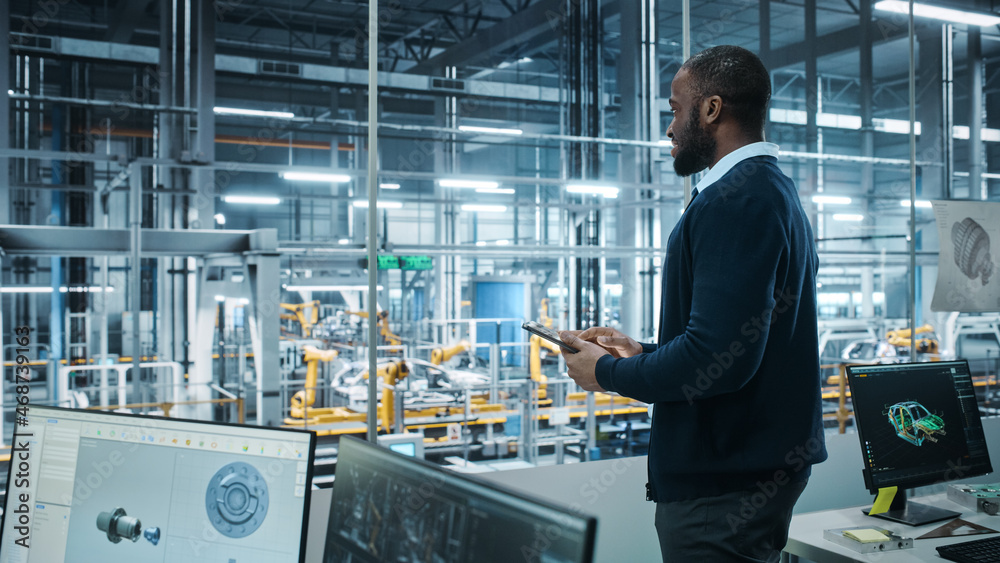 Aufkleber car factory office: portrait of successful black male chief engineer using tablet computer in automa