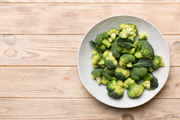 broccoli of fresh green broccoli in bowl over coloredbackground. , close up. Fresh vegetable