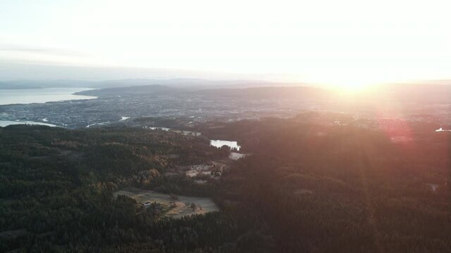 Beautiful Sunrise Over Bymarka Near The City Of Trondheim In Trondelag County, Norway. wide aerial