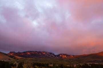 Fototapeta na wymiar Clouds lit by the sunset on the Velebit mountain, Croatia