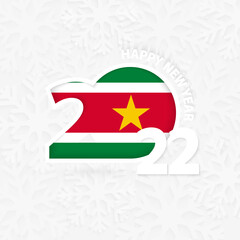 Happy New Year 2022 for Suriname on snowflake background.