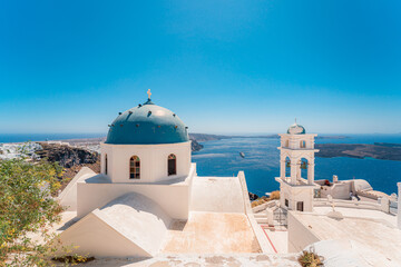 Famous traditional blue dome church in Santorini Island, Greece