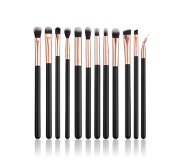 Make-up brushes isolated on white background. Professional makeup paintbrush. Natural and synthetic bristles, black handles and elegant looking make up artist tools. Mockup